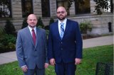 Brothers Philip and Nathan Barnett stand outside the Cabell County Courthouse Oct. 5 following dismissal of their 2011 pleas to the 2002 murder of Deanna Crawford. 